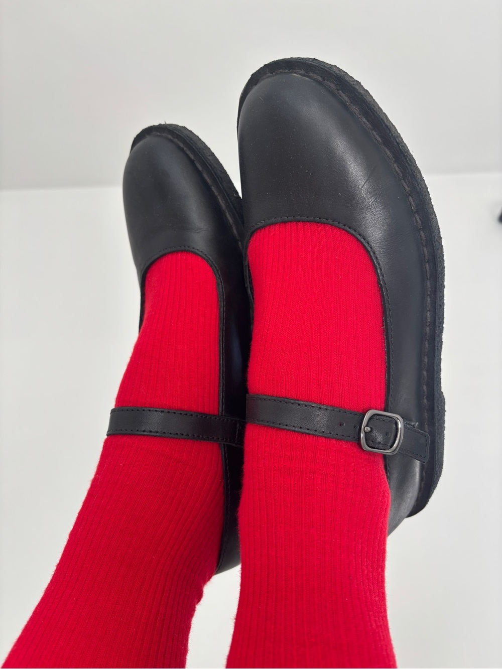 Clarks Black Leather Mary Jane Flats with Red Accent